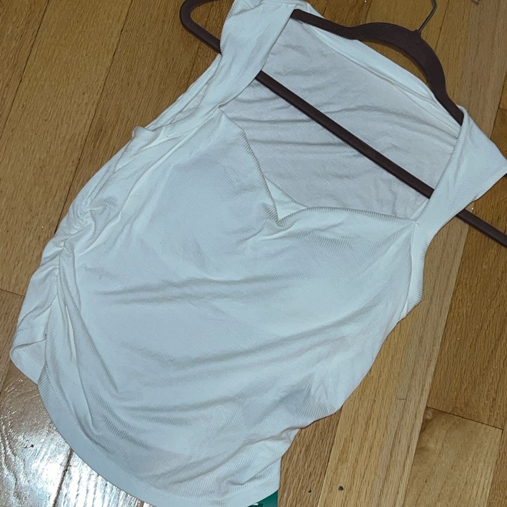 White top with padding (never worn)